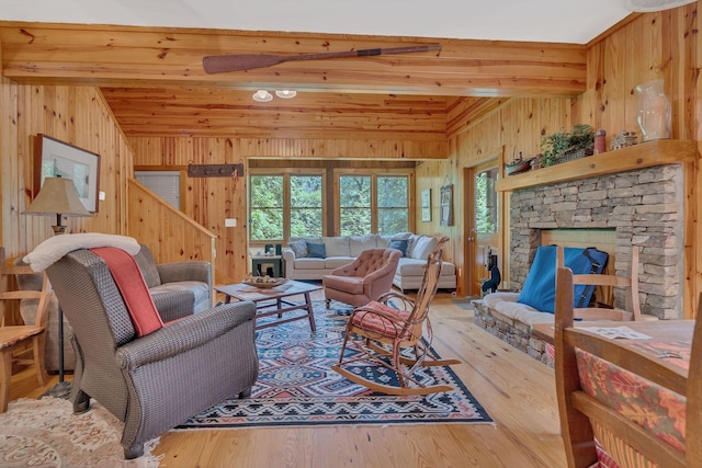 110 Village Way, Lancaster, TN 38569 - living area with wood walls, wood finished floors, lofted ceiling, a fireplace, and wooden ceiling