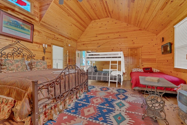 110 Village Way, Lancaster, TN 38569 - bedroom featuring multiple windows, lofted ceiling, wooden walls, wooden ceiling, and wood finished floors