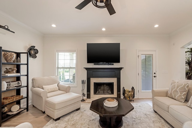2018 Via Francesco Ct, Spring Hill, TN 37174 - living room featuring a ceiling fan, light wood-style floors, a premium fireplace, recessed lighting, and crown molding