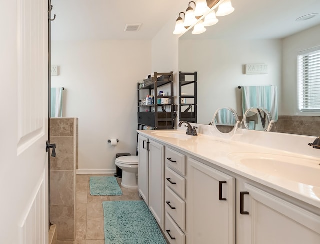 2018 Via Francesco Ct, Spring Hill, TN 37174 - bathroom featuring double vanity, tile patterned floors, a chandelier, and a tile shower