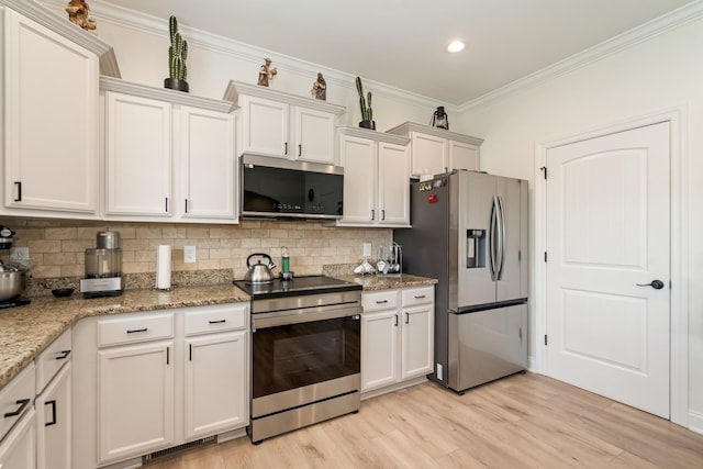 2018 Via Francesco Ct, Spring Hill, TN 37174 - kitchen with stainless steel appliances, backsplash, crown molding, light wood-style flooring, and light stone countertops