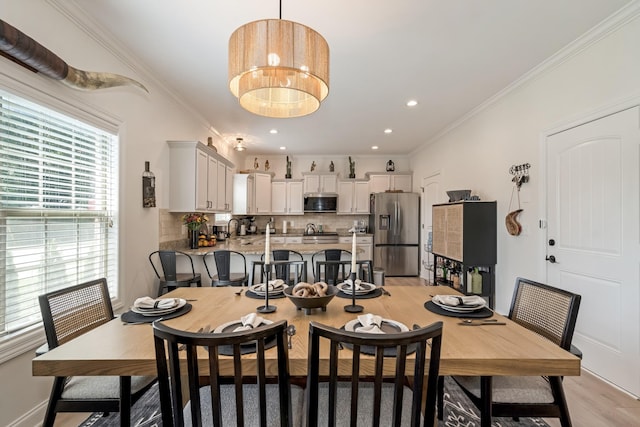 2018 Via Francesco Ct, Spring Hill, TN 37174 - dining area featuring light wood-style flooring, crown molding, and recessed lighting