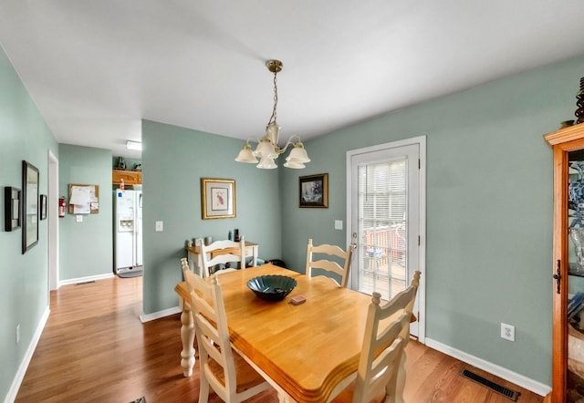 1611 London Dr, Columbia, TN 38401 - dining room featuring a chandelier and wood finished floors