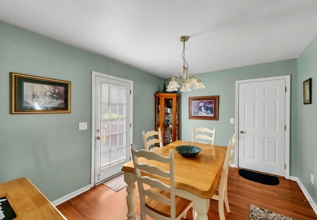 1611 London Dr, Columbia, TN 38401 - dining room with a chandelier and light wood-type flooring