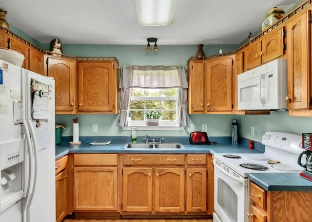 1611 London Dr, Columbia, TN 38401 - kitchen featuring white appliances and brown cabinetry