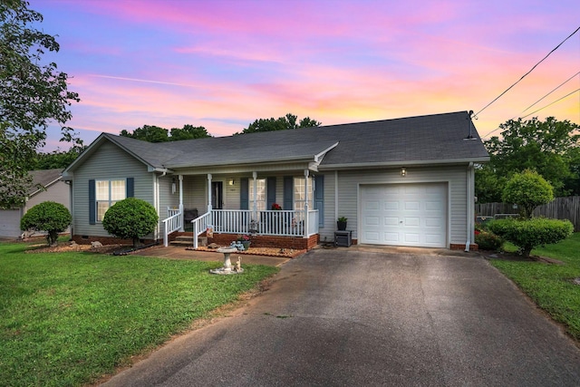 1611 London Dr, Columbia, TN 38401 - ranch-style house with covered porch, an attached garage, driveway, and roof with shingles