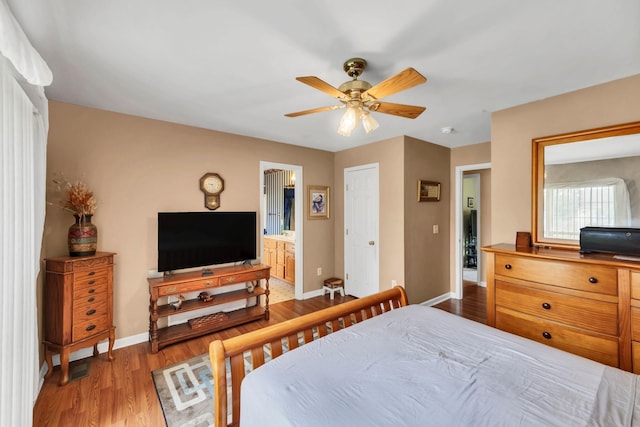 1611 London Dr, Columbia, TN 38401 - bedroom with wood finished floors, ensuite bathroom, and a ceiling fan