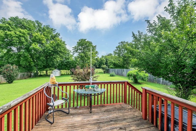 1611 London Dr, Columbia, TN 38401 - deck with a fenced backyard, a shed, and view of scattered trees