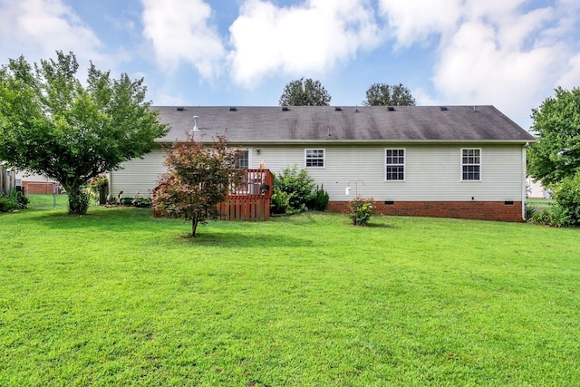 1611 London Dr, Columbia, TN 38401 - back of property with a deck, a lawn, crawl space, and roof with shingles