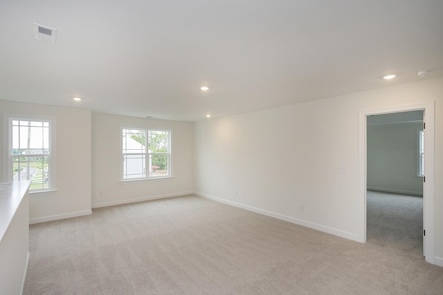 4018 Rampart Way, Spring Hill, TN 37174 - spare room featuring light carpet, recessed lighting, and a smoke detector