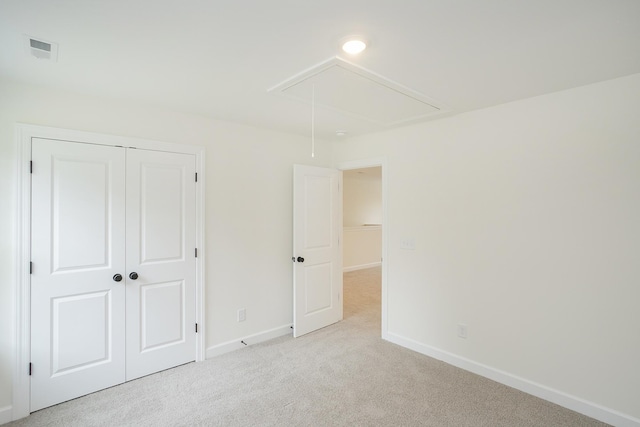 4018 Rampart Way, Spring Hill, TN 37174 - unfurnished bedroom with attic access, carpet floors, and a closet