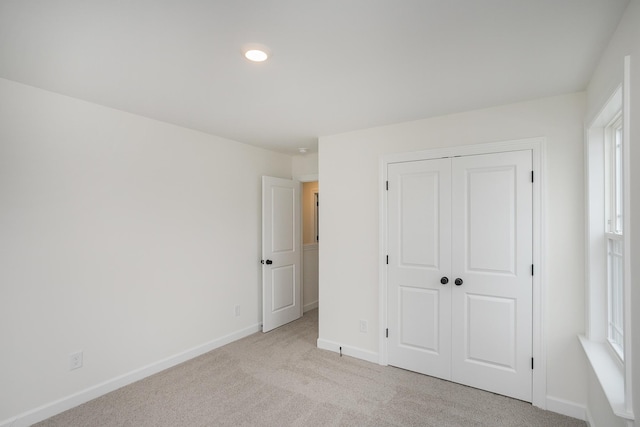 4018 Rampart Way, Spring Hill, TN 37174 - unfurnished bedroom with light carpet, a closet, and recessed lighting