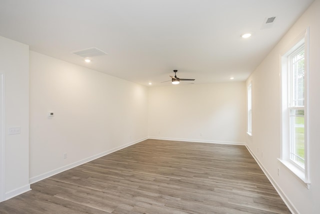 4018 Rampart Way, Spring Hill, TN 37174 - empty room featuring healthy amount of natural light, ceiling fan, wood finished floors, and recessed lighting