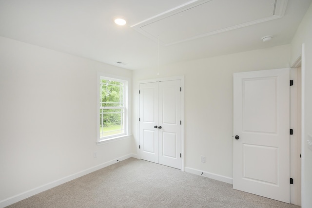 4018 Rampart Way, Spring Hill, TN 37174 - unfurnished bedroom featuring attic access, carpet, a closet, and recessed lighting