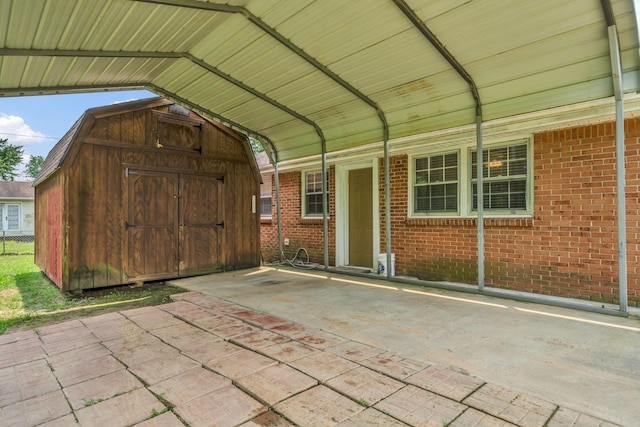 575 Cynthia Dr, Clarksville, TN 37042 - view of patio / terrace featuring a storage unit and a detached carport