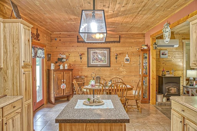 1034 Gaw Branch Rd, Gainesboro, TN 38562 - dining area with wooden walls, a wall unit AC, wooden ceiling, light tile patterned floors, and a wood stove