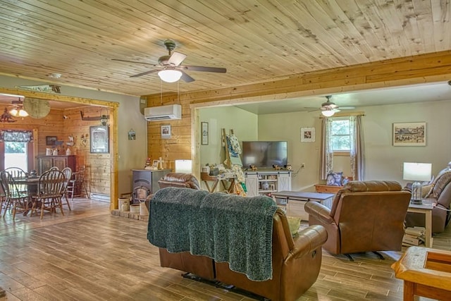 1034 Gaw Branch Rd, Gainesboro, TN 38562 - living room with ceiling fan, an AC wall unit, wood finished floors, wooden ceiling, and wood walls