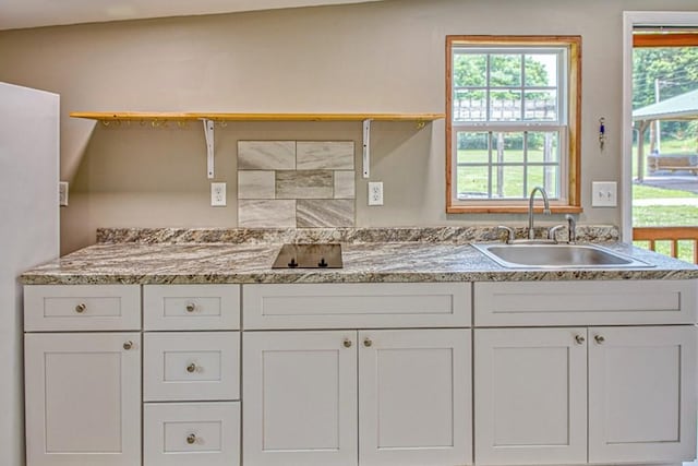 1034 Gaw Branch Rd, Gainesboro, TN 38562 - kitchen with white cabinets and light stone countertops