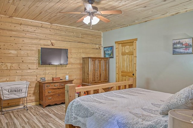 1034 Gaw Branch Rd, Gainesboro, TN 38562 - bedroom with wooden ceiling, wood finished floors, wooden walls, and ceiling fan