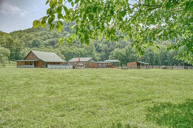 1034 Gaw Branch Rd, Gainesboro, TN 38562 - view of yard with an outdoor pool and a view of trees
