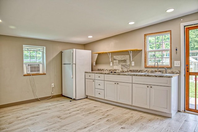 1034 Gaw Branch Rd, Gainesboro, TN 38562 - kitchen with freestanding refrigerator, cooling unit, light wood-style flooring, open shelves, and recessed lighting