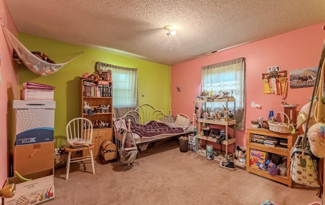 5011 Sunny Acres Dr, Waynesboro, TN 38485 - carpeted bedroom with a textured ceiling
