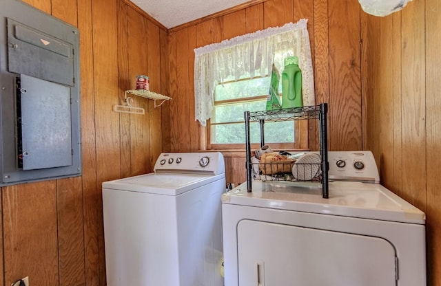 5011 Sunny Acres Dr, Waynesboro, TN 38485 - laundry area featuring independent washer and dryer and wood walls