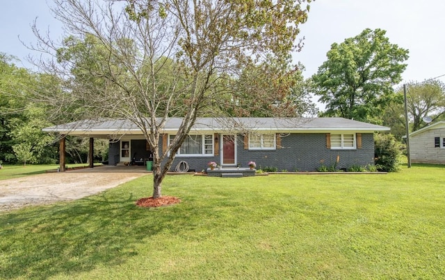5011 Sunny Acres Dr, Waynesboro, TN 38485 - ranch-style house with driveway, an attached carport, and a front yard