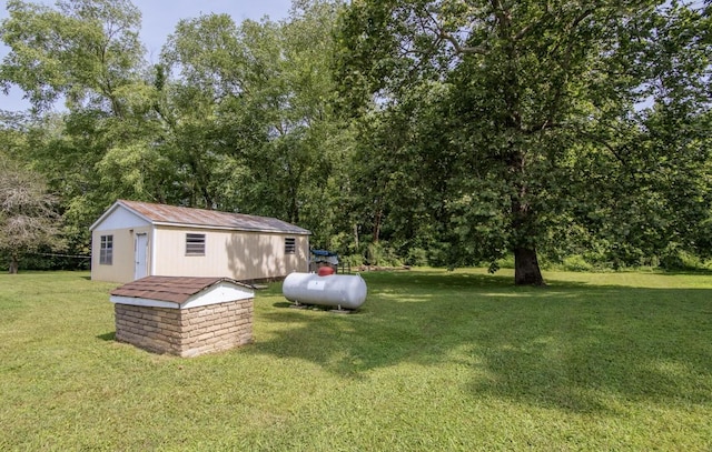 5011 Sunny Acres Dr, Waynesboro, TN 38485 - view of green lawn with a storage unit