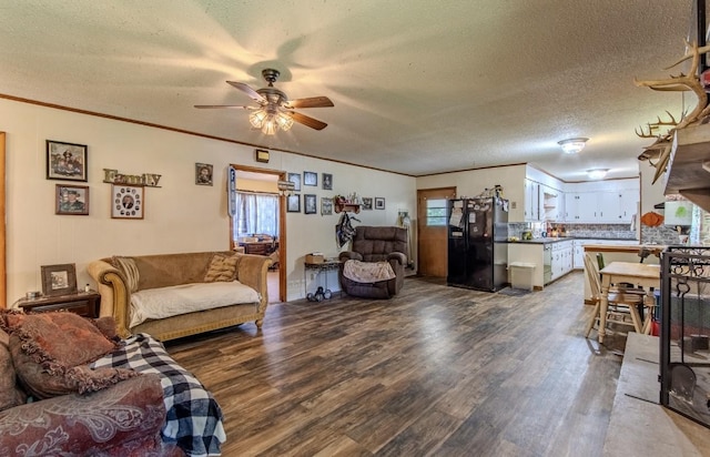 5011 Sunny Acres Dr, Waynesboro, TN 38485 - living room with dark wood-style floors, a ceiling fan, a textured ceiling, and crown molding