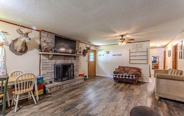 5011 Sunny Acres Dr, Waynesboro, TN 38485 - living room featuring a textured ceiling, wood finished floors, crown molding, ceiling fan, and a fireplace