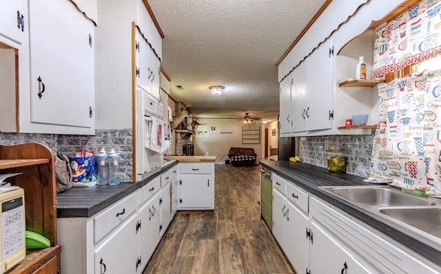 5011 Sunny Acres Dr, Waynesboro, TN 38485 - kitchen with a textured ceiling, open shelves, a ceiling fan, dark countertops, and white appliances
