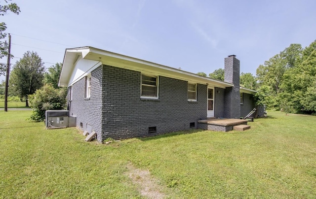 5011 Sunny Acres Dr, Waynesboro, TN 38485 - back of house with crawl space, a chimney, a yard, and brick siding