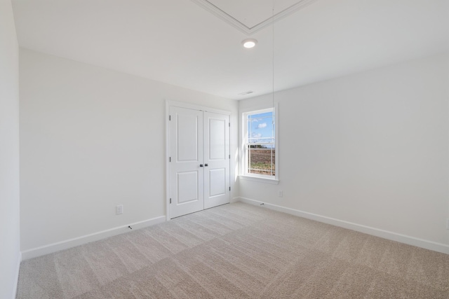 4016 Rampart Way, Spring Hill, TN 37174 - unfurnished bedroom with attic access, light carpet, recessed lighting, and a closet