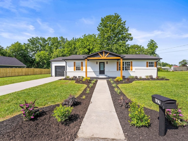 227 Shady Grove Rd, Manchester, TN 37355 - ranch-style home with driveway, a garage, and covered porch