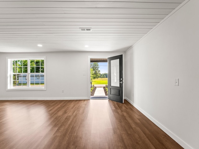 227 Shady Grove Rd, Manchester, TN 37355 - spare room with healthy amount of natural light, dark wood-style floors, and recessed lighting