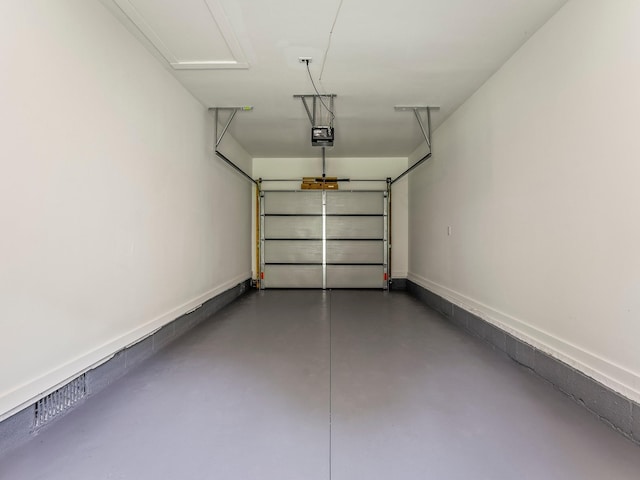 227 Shady Grove Rd, Manchester, TN 37355 - garage featuring a garage door opener