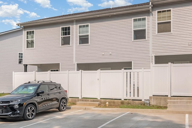 523 Moshe Flam Pl, La Vergne, TN 37086 - rear view of house featuring uncovered parking
