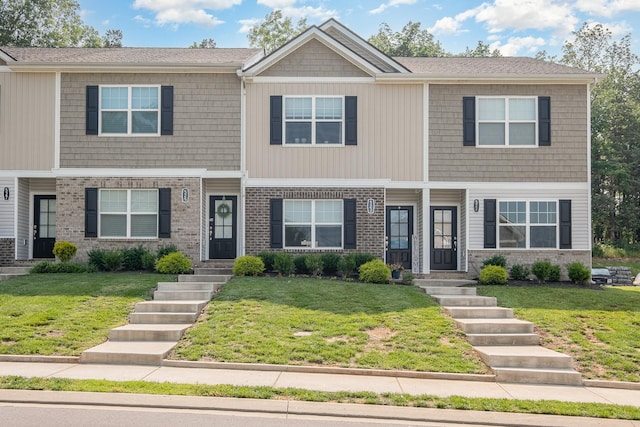 523 Moshe Flam Pl, La Vergne, TN 37086 - view of property featuring a front lawn and brick siding