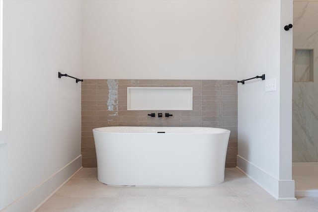 1135 Delmas Ave, Nashville, TN 37216 - full bath featuring a freestanding bath, tile patterned floors, tile walls, and a shower
