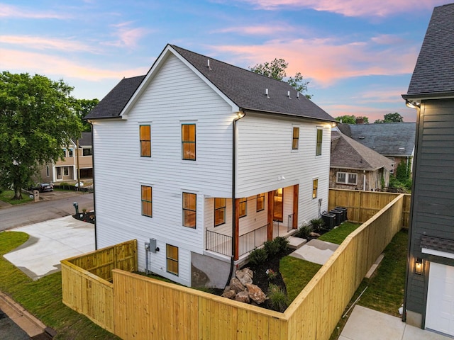1135 Delmas Ave, Nashville, TN 37216 - back of property featuring a fenced front yard and roof with shingles