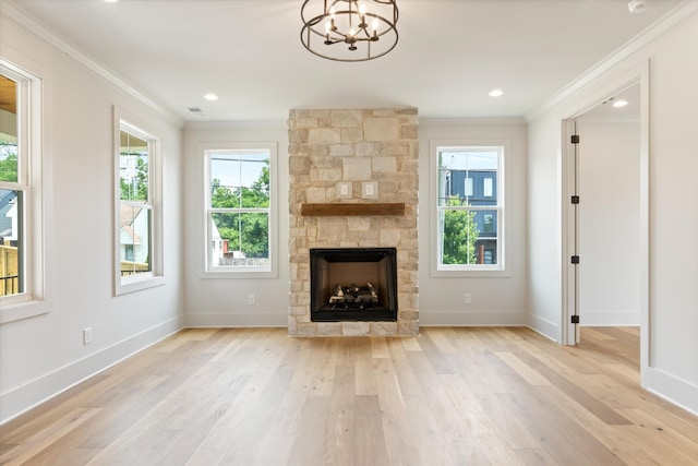 1135 Delmas Ave, Nashville, TN 37216 - unfurnished living room featuring ornamental molding, a stone fireplace, light wood finished floors, a chandelier, and recessed lighting