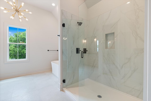 1135 Delmas Ave, Nashville, TN 37216 - full bath with a chandelier, a marble finish shower, a soaking tub, and tile patterned floors
