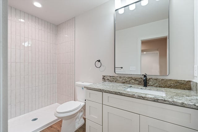 1135 Delmas Ave, Nashville, TN 37216 - full bath with wood finished floors, a tile shower, vanity, and recessed lighting