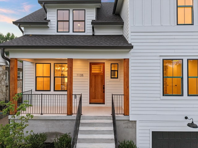 1135 Delmas Ave, Nashville, TN 37216 - view of front of property with a porch, roof with shingles, and board and batten siding