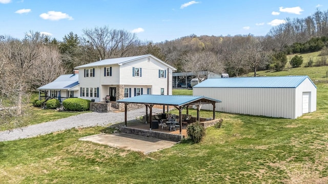 1036 Locke Creek Rd, Readyville, TN 37149 - back of property featuring a yard, a gazebo, and an outdoor structure