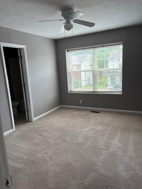 348 Arapaho Dr, Murfreesboro, TN 37128 - carpeted empty room with baseboards and a ceiling fan