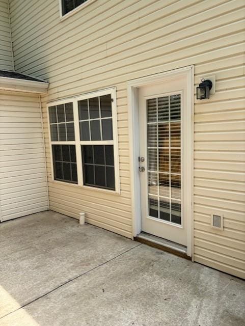 348 Arapaho Dr, Murfreesboro, TN 37128 - view of exterior entry featuring a patio area