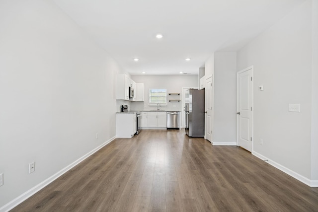 344 Kristen Ct, Columbia, TN 38401 - unfurnished living room featuring dark wood-type flooring and recessed lighting
