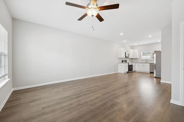 344 Kristen Ct, Columbia, TN 38401 - unfurnished living room featuring ceiling fan, wood finished floors, and recessed lighting